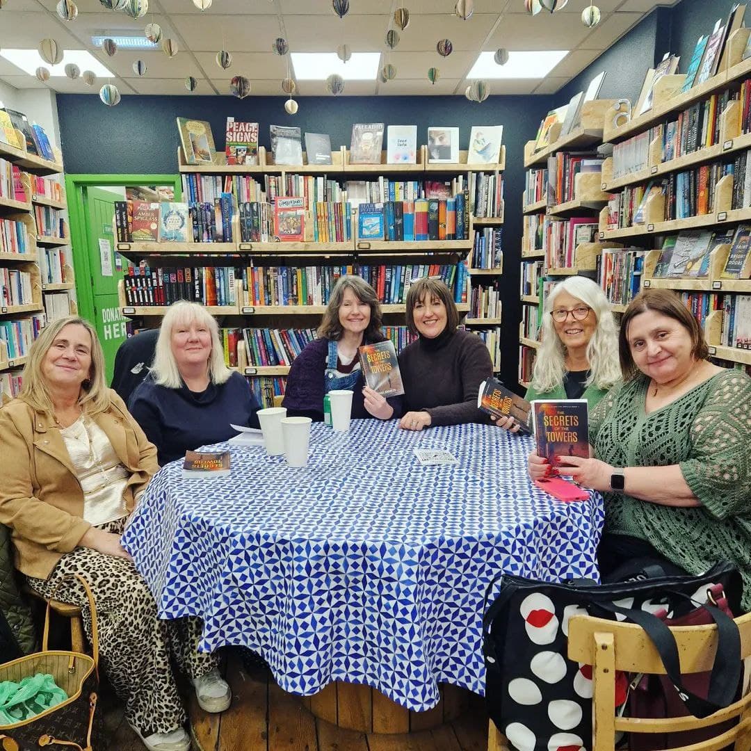 A cozy book club meeting with people and books
